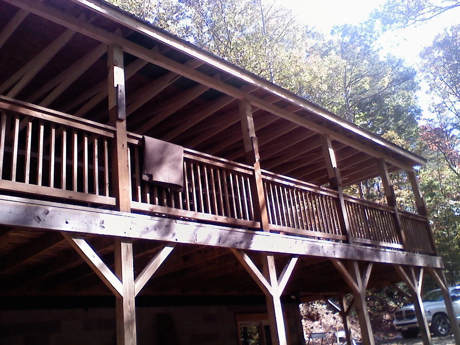 Timber framing under a new elevated porch and deck — Roof Leak Repair in Sanders by Roofing Brothers